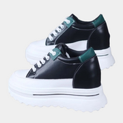 Schwarze klobige Plateau-Sneaker