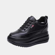 Schwarze Plateau-Sneaker für Damen