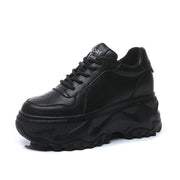 Schwarze Plateau-Sneaker Neu