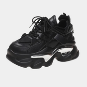Schwarze Sneaker mit Plateau