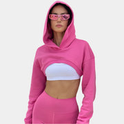 Sudadera con capucha y top corto de color rosa