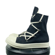 Bottes noires pour homme à semelle en caoutchouc