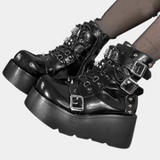 Bottes à plateforme à boucle blanche