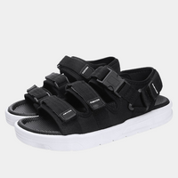 Techwear Sandals Platform - Black platform sandals with triple buckle straps, white sole, product shot