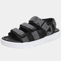 Grey Techwear Sandals Platform - Single gray and black platform sandal product shot angled view