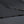 Close-up of the black metal ribs of the katana umbrella