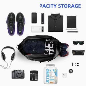 Black 35 litre duffel bag with grab handles and a detachable shoulder strap