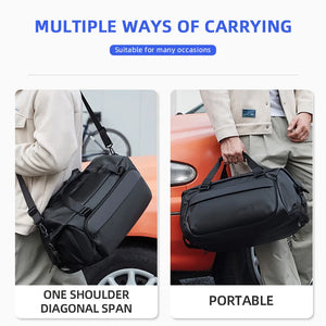 Black 35 litre duffel bag with grab handles and a detachable shoulder strap