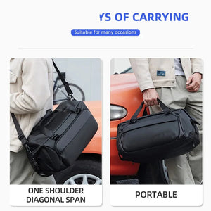 Black 35 litre duffel bag with grab handles and a detachable shoulder strap