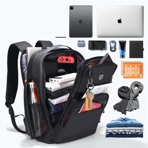 Black 36 litre business backpack with multiple compartments and a luggage strap