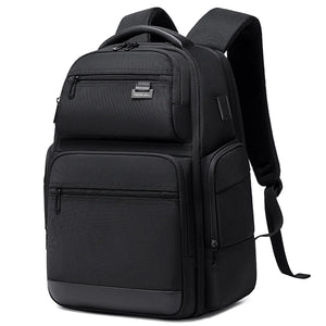 Large black 43 litre backpack with a laptop compartment and a padded back