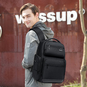 Large black 43 litre backpack with a laptop compartment and a padded back