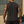 Back view on the model outdoors, plain snow-washed black body with the hem torn open at both sides