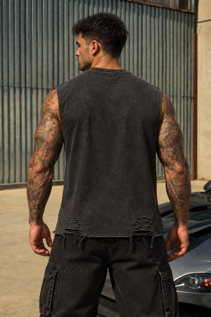Back view on the model outdoors, plain snow-washed black body with the hem torn open at both sides