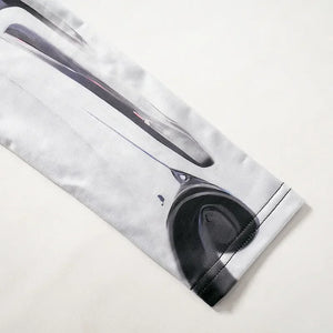 Close-up of a black and white patterned product on a light gray background