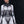 Person wearing a futuristic, white and black bodysuit with mechanical design elements on a black background.