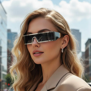Woman wearing futuristic sunglasses with a cityscape background