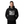 Person wearing a black hoodie with a graphic design on a gray background