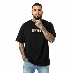 Man wearing a black t-shirt with 'CYBER' text on a white background