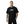 Man wearing a black t-shirt with 'CYBER TECHWEAR' text on a white background