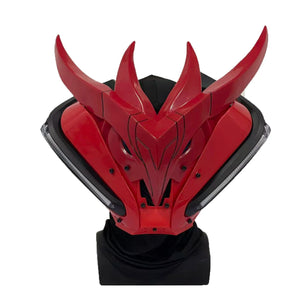 Red dragon helmet with black accents on a white background
