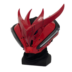 Red dragon helmet with black accents on a white background