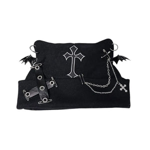 Black harness with cross and bat design on a white background