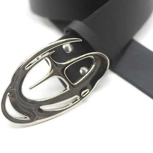 Close-up of a metallic keychain with a distinctive design on a white background