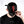 Akuma Kanji Cyberpunk Cap worn front on with a black face mask, red kanji embroidery down the crown