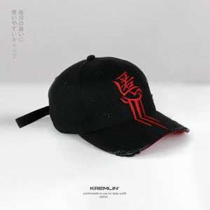 Akuma Kanji Cyberpunk Cap in black, three-quarter view of the red kanji, frayed brim and hanging strap