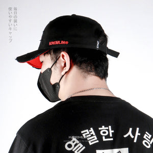 Akuma Kanji Cyberpunk Cap worn from behind, red printed lining visible under the frayed brim