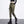 Army green toggle techwear joggers, woman in front view with a drawstring waist, cord toggles and ankle cuffs