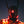 Black techwear mask with tall antenna blades and a red triangle indicator