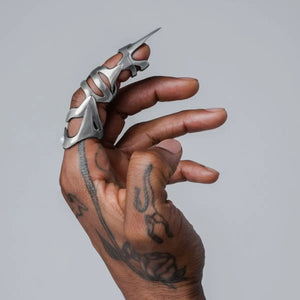 Titanium armour ring covering the full finger with a clawed tip
