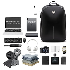 Black backpack with a moulded armoured shell front and a top grab handle