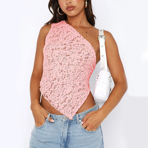 Asymmetric Lace Y2K Top in pink, front view of the pointed hem worn with light jeans and a white bag