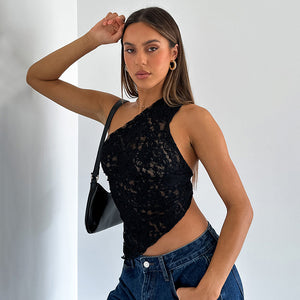 Asymmetric Lace Y2K Top in black, one-shoulder lace with the side cut away, hand raised to the head