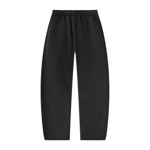 Black barrel leg sweatpants laid flat from the back, showing the rounded leg and elastic waistband