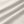Pale Khaki woven fabric of the workout shorts in soft folds, smooth surface with a slight sheen