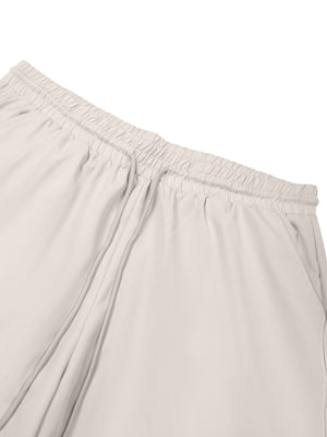 Close-up of the Pale Khaki shorts waistband with the elastic band, drawstring and slash pocket