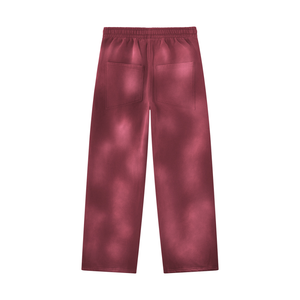 Dark Red wide leg sweatpants laid flat from the back, showing the mottled wash and both back pockets