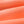 Close-up of the Orange sun faded fabric on the sweatpants, showing the cloudy, uneven vintage wash