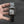 Silver baroque watch with a rectangular red dial and Roman numerals