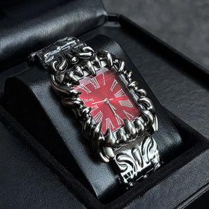 Silver baroque watch with a rectangular red dial and Roman numerals