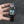 Silver baroque watch with a rectangular red dial and Roman numerals