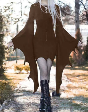 Dark brown gothic mini dress with long pointed sleeves, front walking view with black platform boots