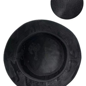 All black camouflage bucket hat with a wide brim