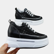Schwarze High-Plateau-Sneaker