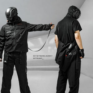 The long carry strap of the Black Hooded Techwear Windbreaker pulled out to its full length by the wearer