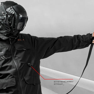 Close-up of the carry strap anchored inside the Black Hooded Techwear Windbreaker, next to a chest flap pocket